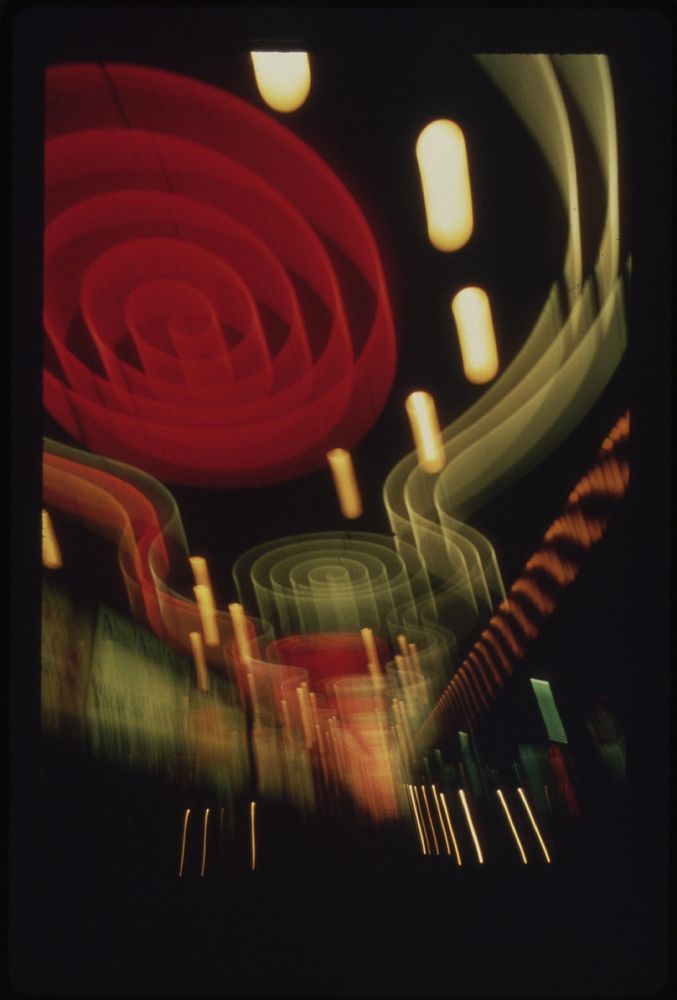 Light patterns created by multi-colored casino displays in downtown Las Vegas, May 1972. Photographer: O'Rear, Charles.…