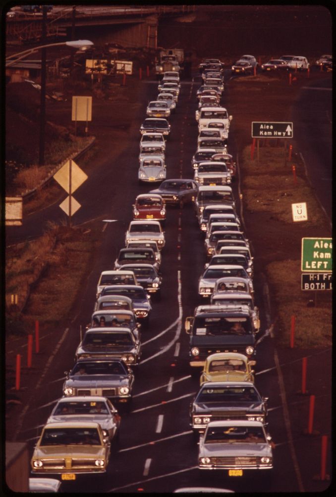 Construction bottleneck on H-1 Freeway approaching Honolulu from west during morning rush hour. Commuters come from such…