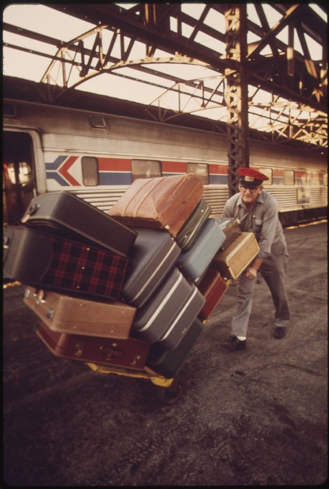 Redcap unloading baggage at Union Station in Kansas City Missouri, June 1974. Photographer: O'Rear, Charles. Original public…
