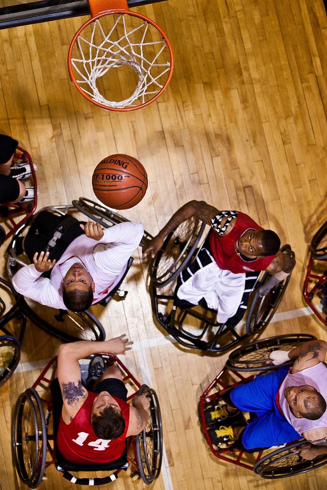 Marines with the Wounded Warrior Regiment practice wheelchair basketball during practice for the 2012 Warrior Games at…
