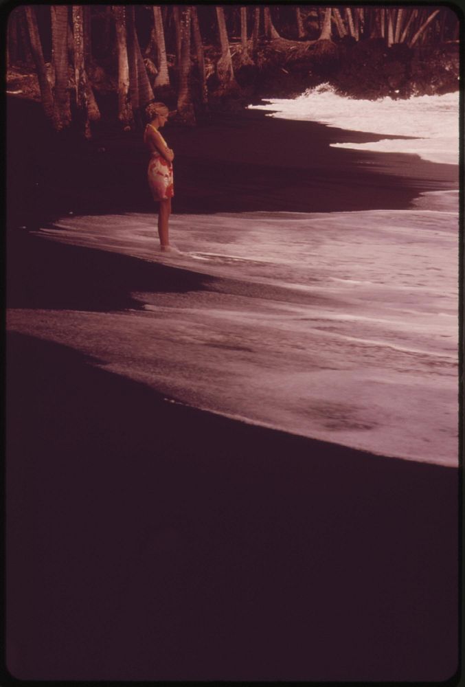 Famous Black Sand Beach at Kaimu, created by lava runoff, is a favorite tourist stop, November 1973. Photographer: O'Rear…