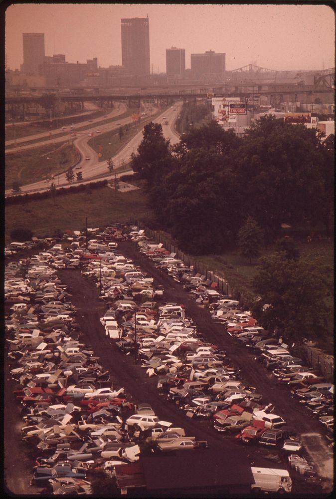 Automobile Junkyard Can Be Seen From High Rise Buildings In Downtown, September 1972. Photographer: Strode, William.…