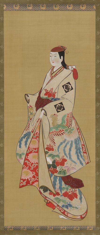 Tall girl; dress patterned with ho-o bird and kiri flowers