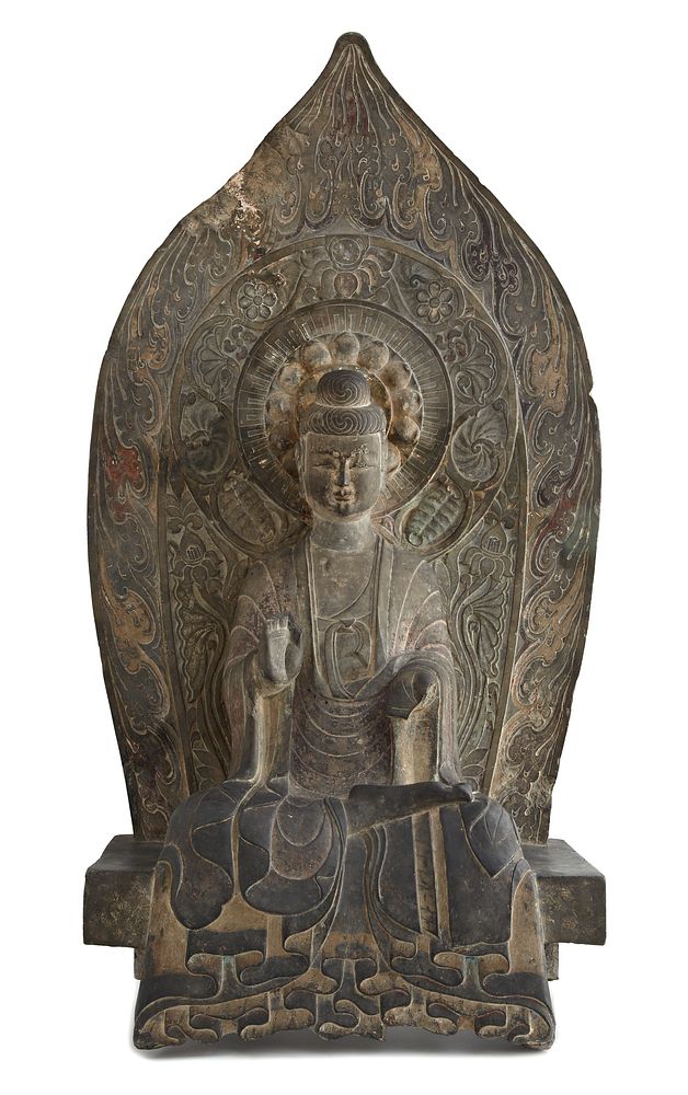 Seated figure of the Buddha Sakyamuni in high relief