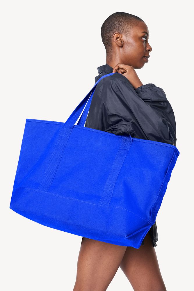 African girl with  blue oversized tote bag