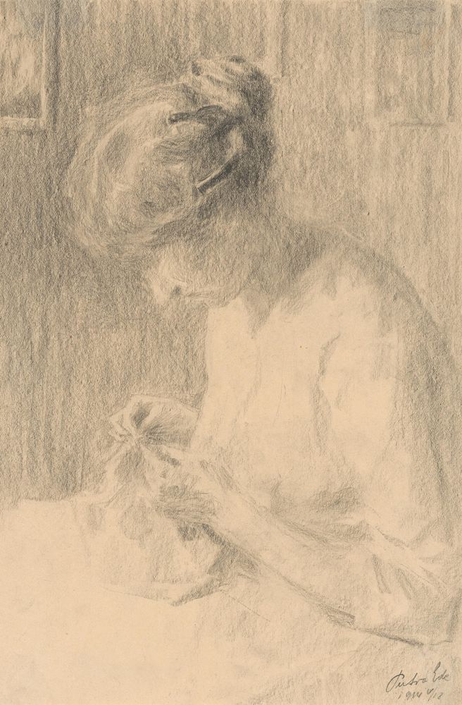 Woman sewing in profile