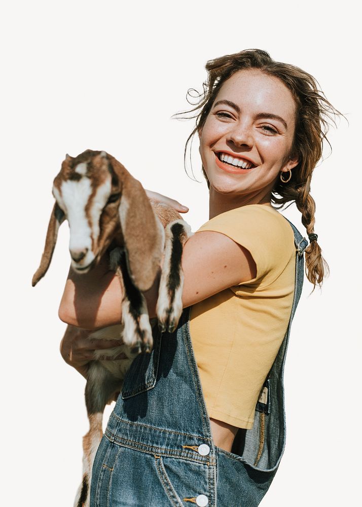 Woman holding baby goat isolated image
