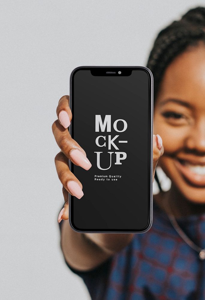 Black woman showing a phone mockup