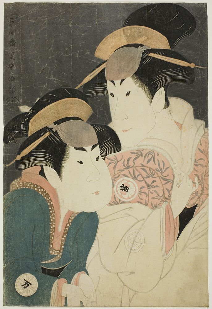 The actors Segawa Tomisaburo II (R) as Yadorigi, wife of Ogishi Kurando, and Nakamura Manyo (L) as the servant Wakakusa by…