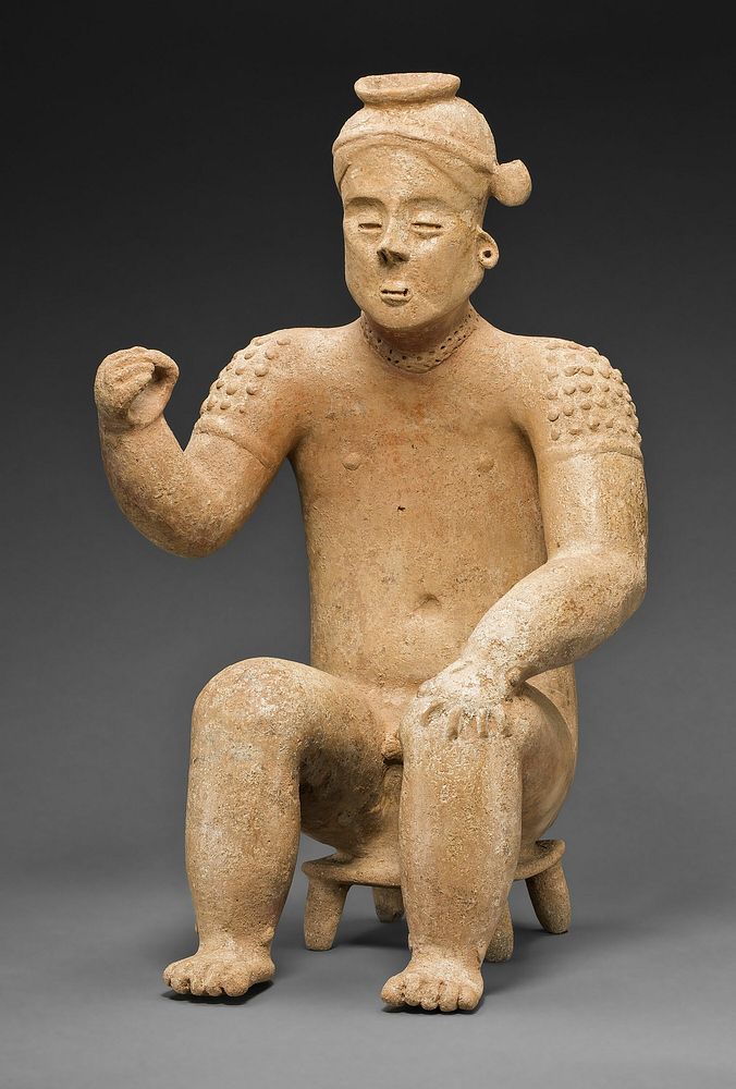 Seated Male Figure with One Arm Raised by Colima