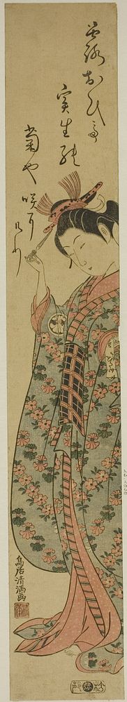 The Actor Segawa Kikunojo II as a woman holding a hairpin by Torii Kiyomitsu I