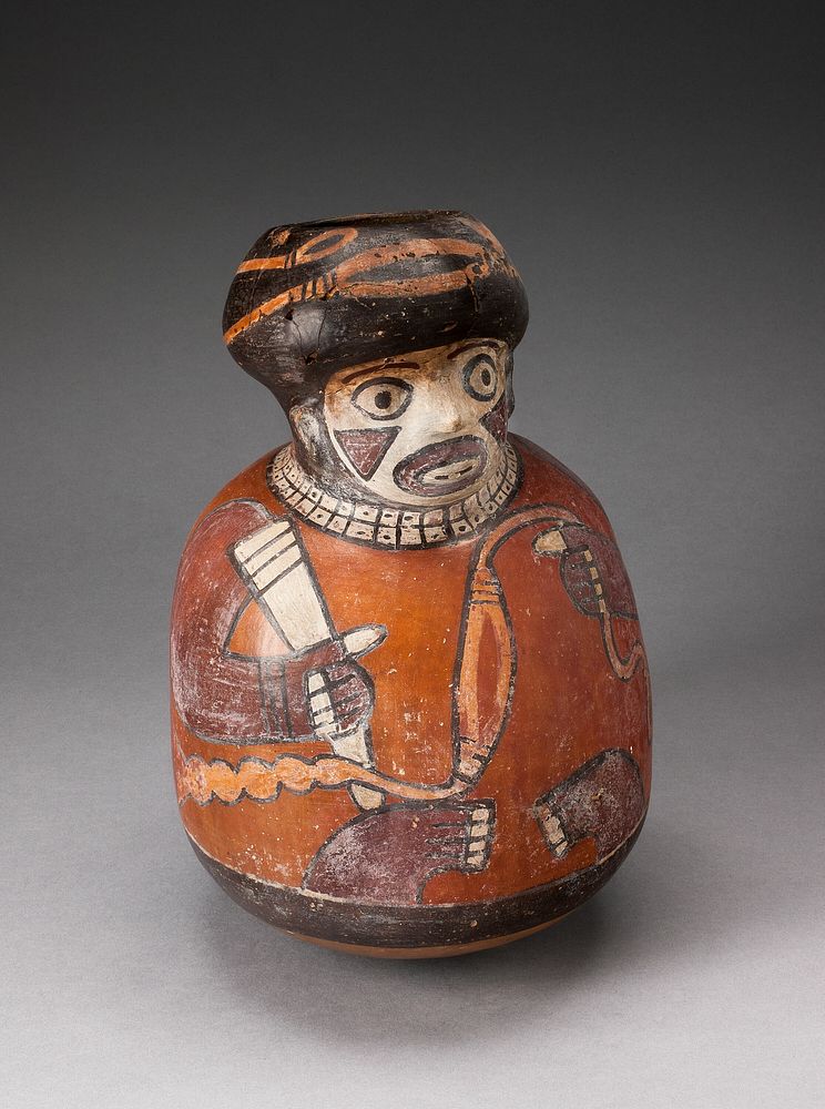 Jar in the Form of a Warrior Holding a Sling and Club by Nazca
