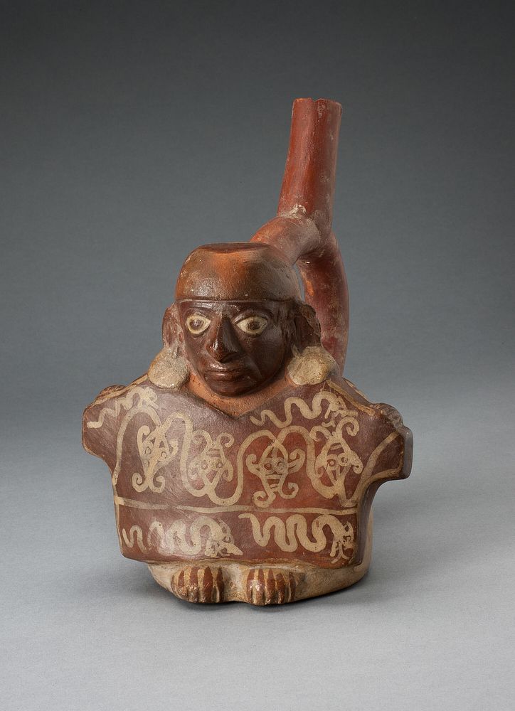 Stirrup Spout Vessel Depicting Man Holding Decorated Textile by Moche