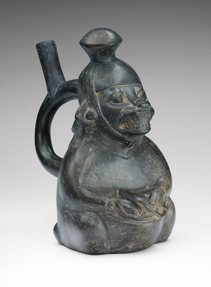 Vessel in the Form of a Masked Drummer by Moche