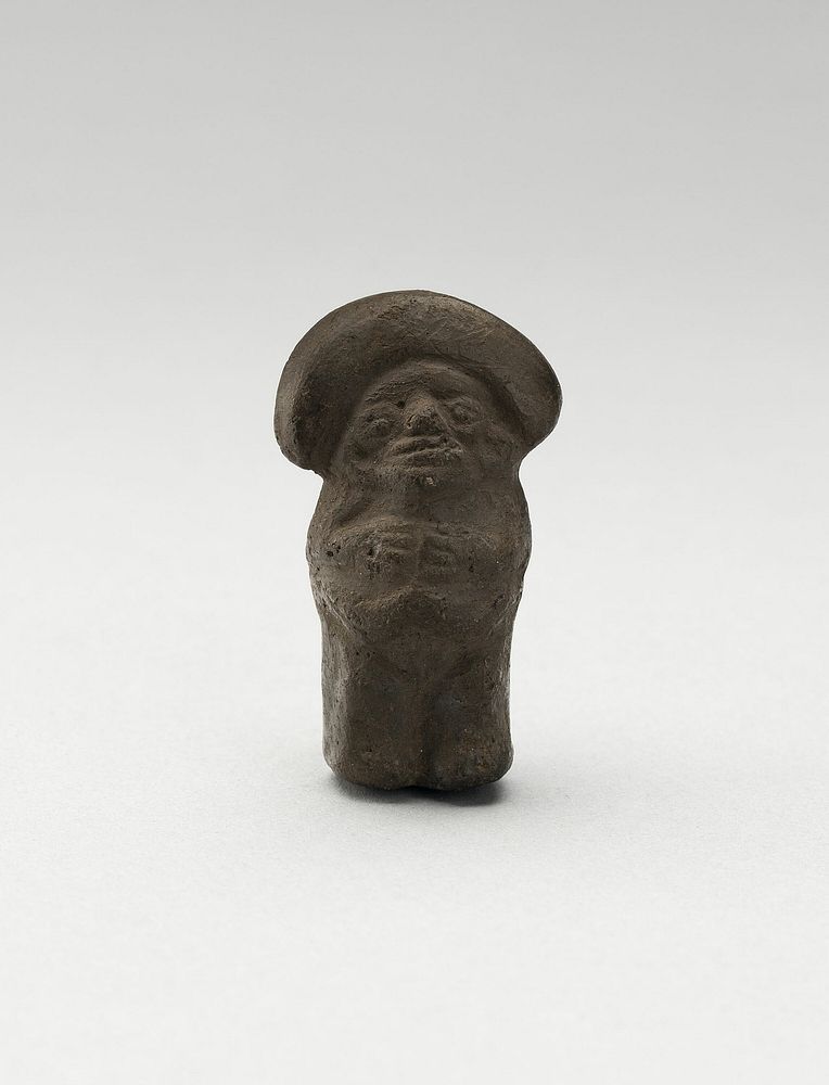 Mold-Made Blackware Pendant with Rounded Headdress by Moche