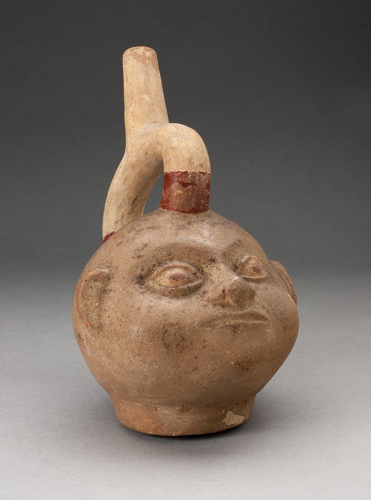 Portrait Vessel of a Ruler with Large Cheeks by Moche