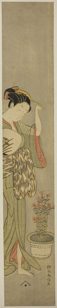 Beauty Adjusting Her Hairpin by Suzuki Harunobu