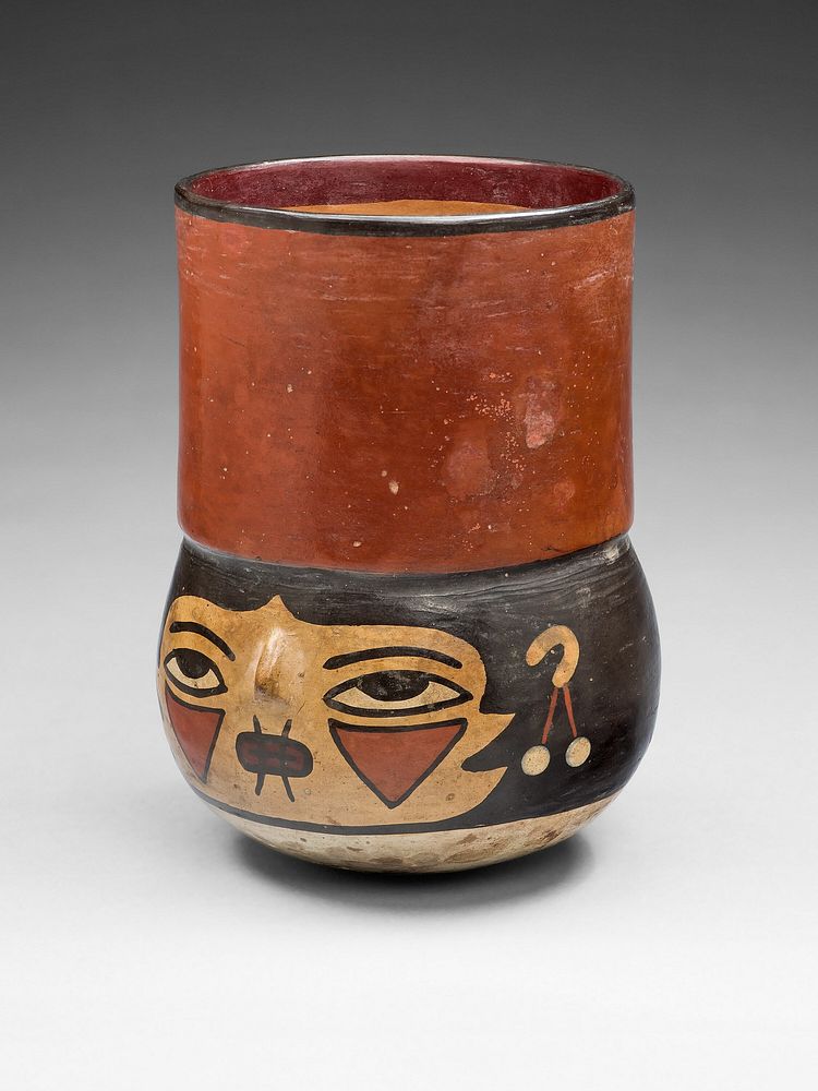 Beaker in the Form of a Trophy Head with Bound Lips by Nazca