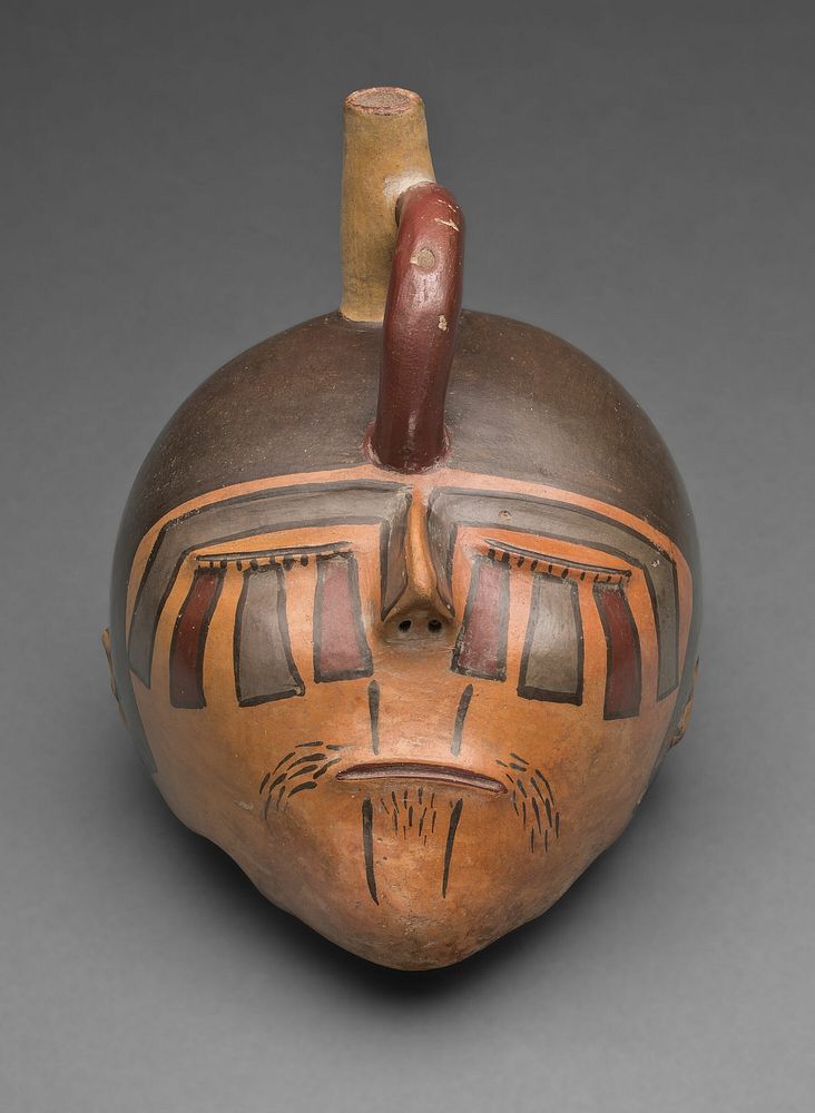 Bottle in the Form of a Severed Trophy Head by Nazca