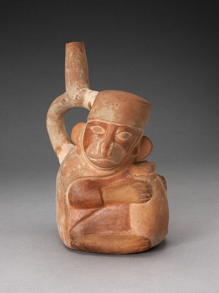 Handle Spout Vessel in Form of a Monkey Holding a Jar by Moche