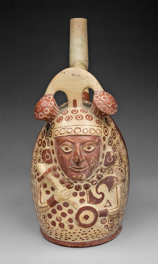 Handle Spout Vessel in the Form of a Bean Warrior by Moche