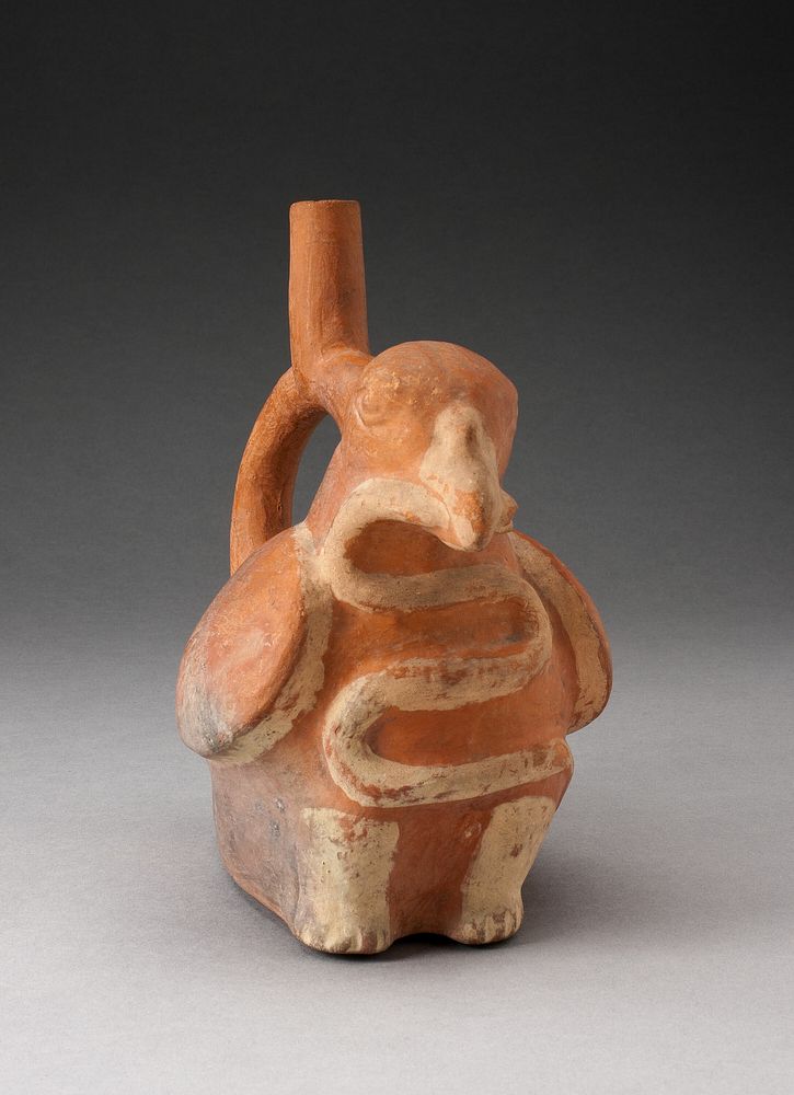 Handle Spout Vessel in Form of a Bird Eating a Snake by Moche