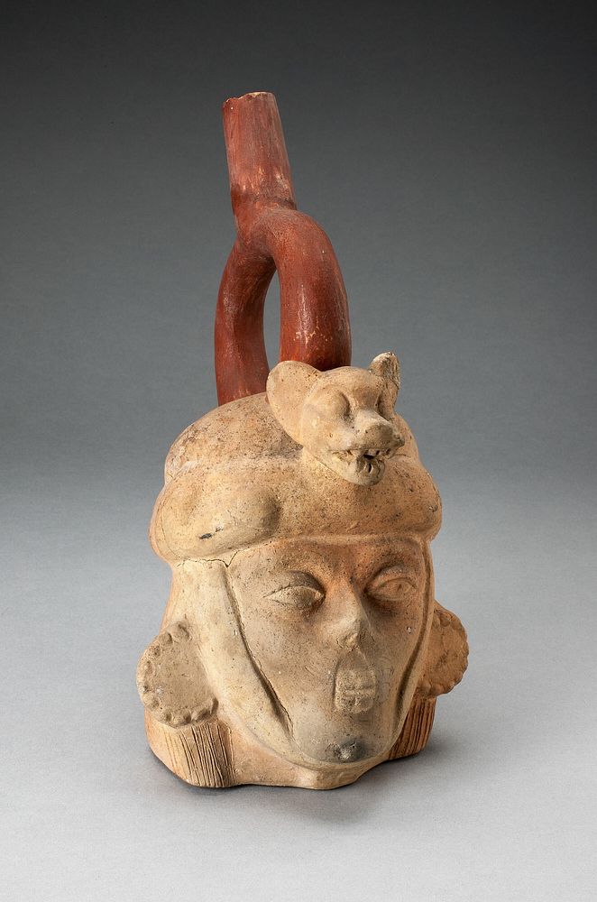 Portrait Vessel of a Ruler with Feline Headdress and Facial Deformities by Moche