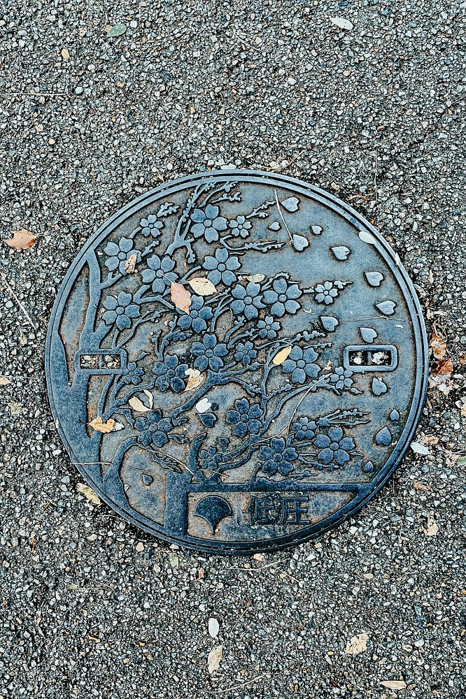 Electricity Maintenance Hole Cover, Tokyo, JapanAn electricity maintenance hole cover for high-tension current lines…