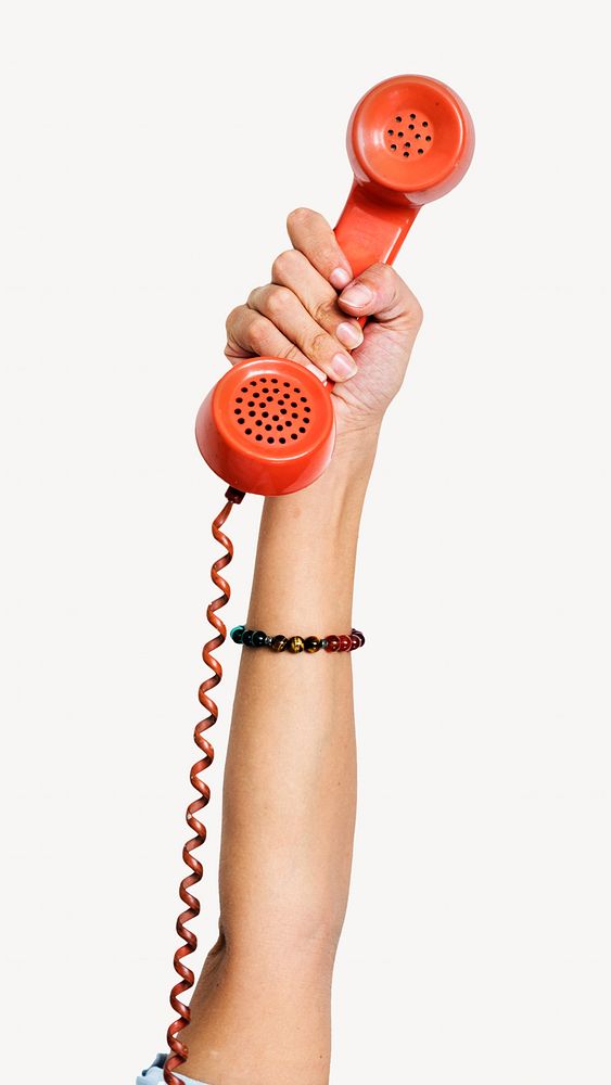 Hand holding red retro landline