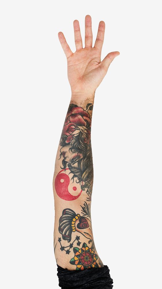 Tattooed hand raise isolated image