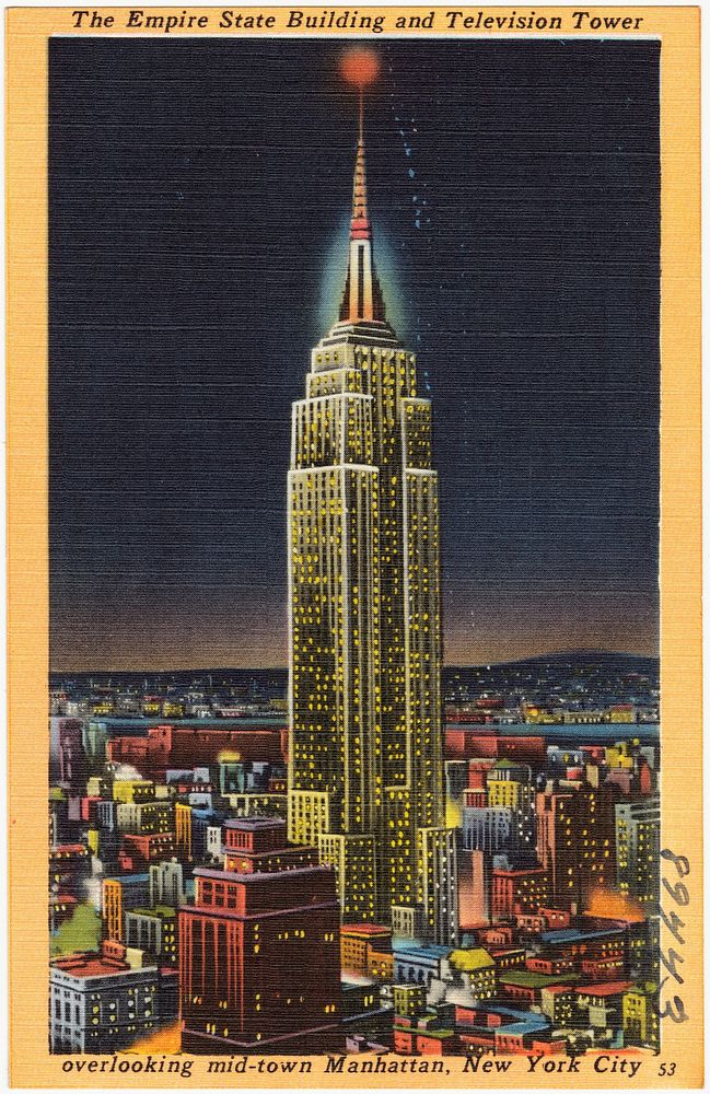             The Empire State Building and television tower, overlooking mid-town Manhattan, New York City          