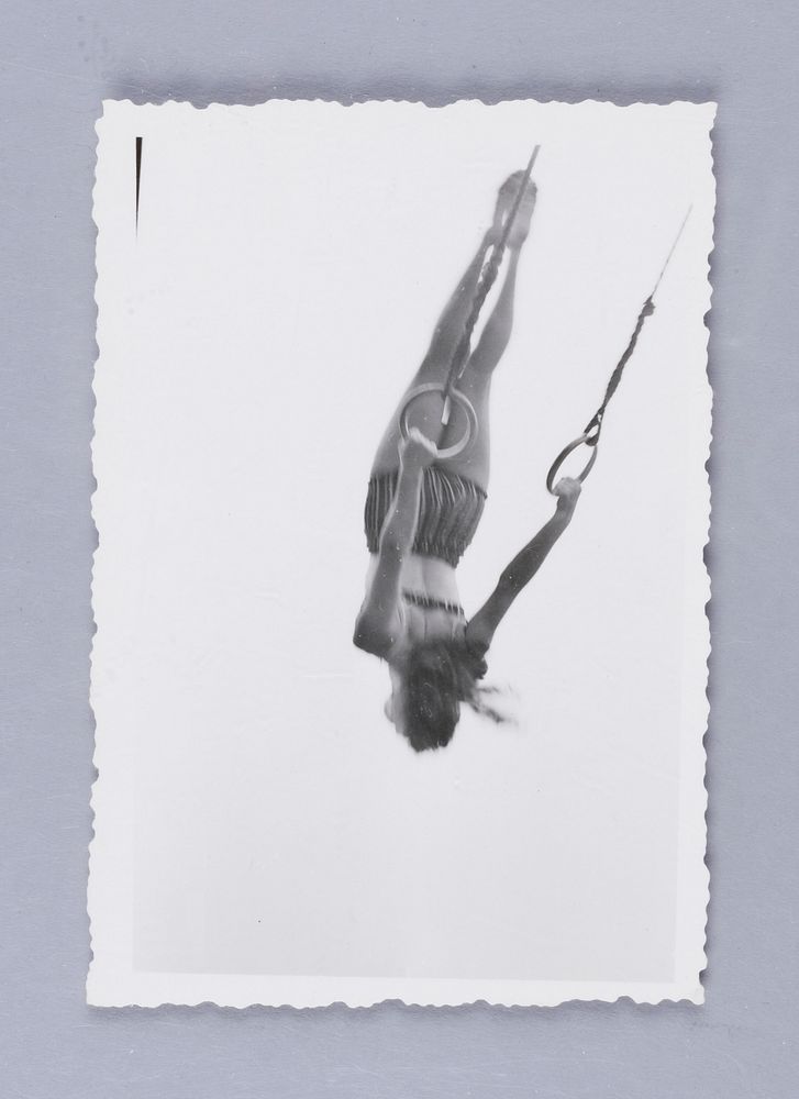 Untitled (Woman Swinging on Rings)