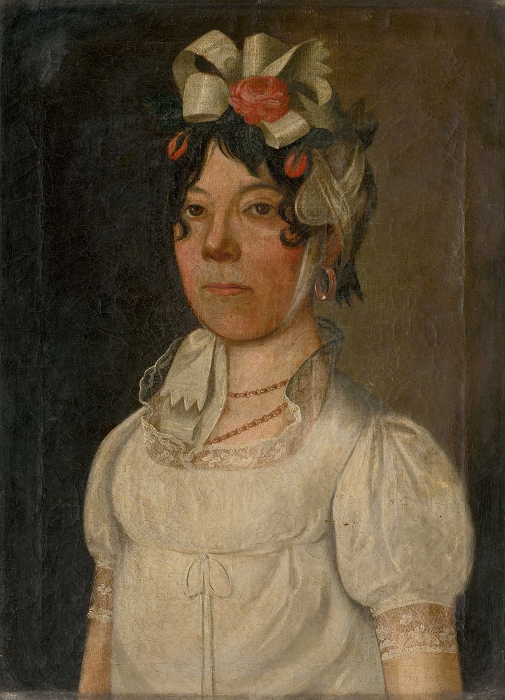 Portrait of a young woman in white dress