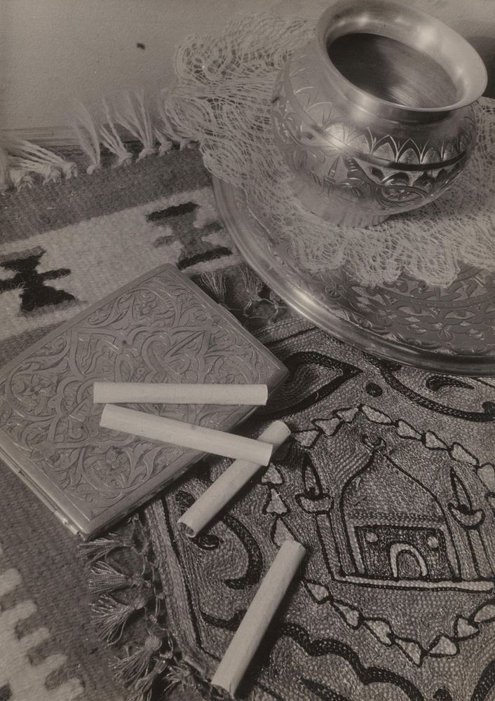 Still life with scattered cigarettes by Milos Dohnány