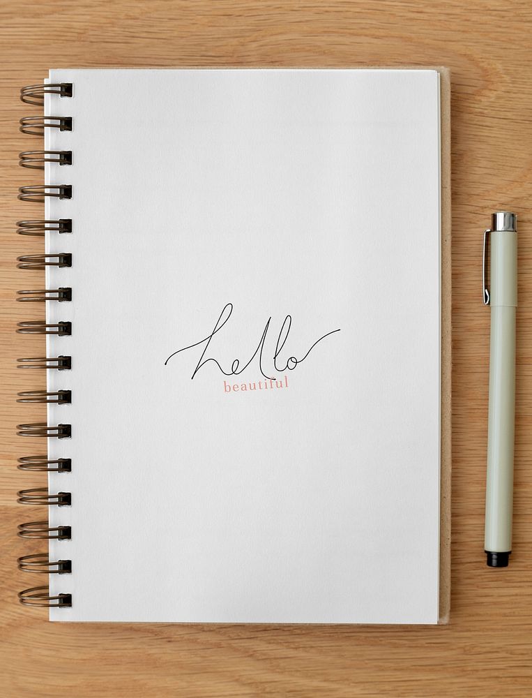 Blank plain white notebook page with a pen mockup