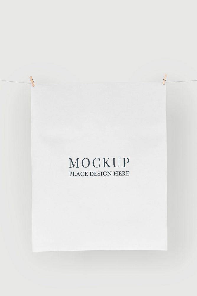 Papers mockup psd hanging from a rope with paper clips