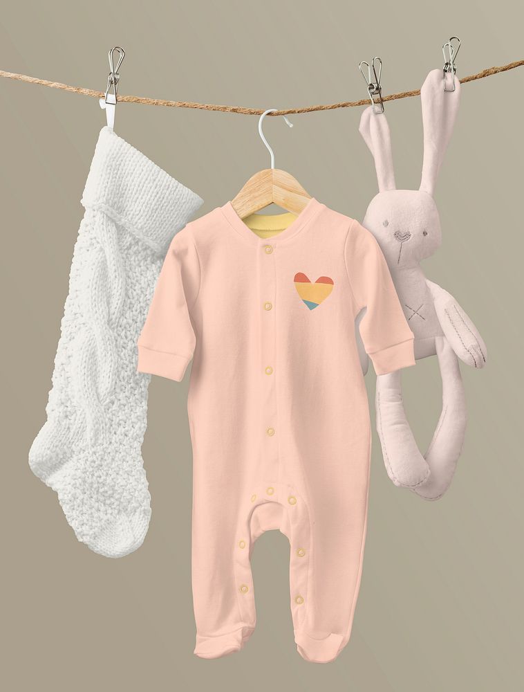 Baby pajamas mockup, kids apparel in peachy pink psd