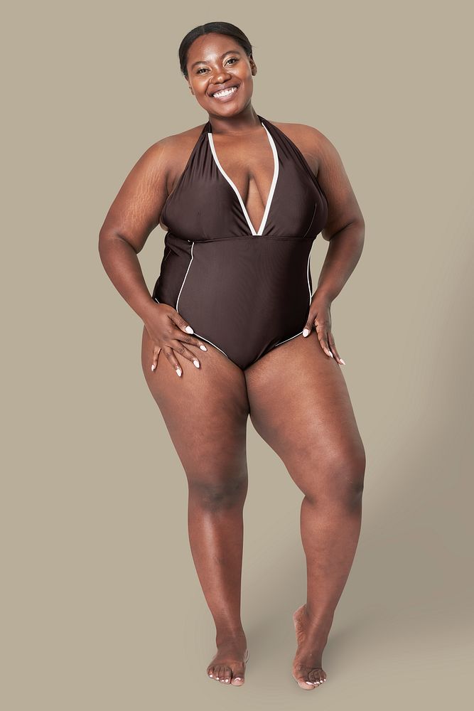 Body positivity psd brown swimsuit happy plus size model posing