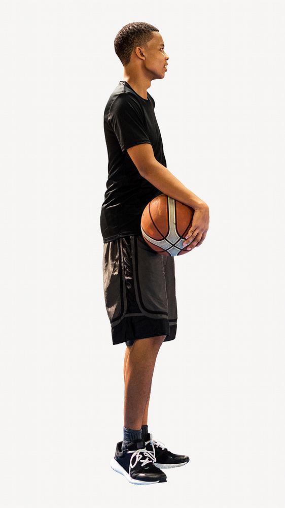 Boy holding basketball isolated image