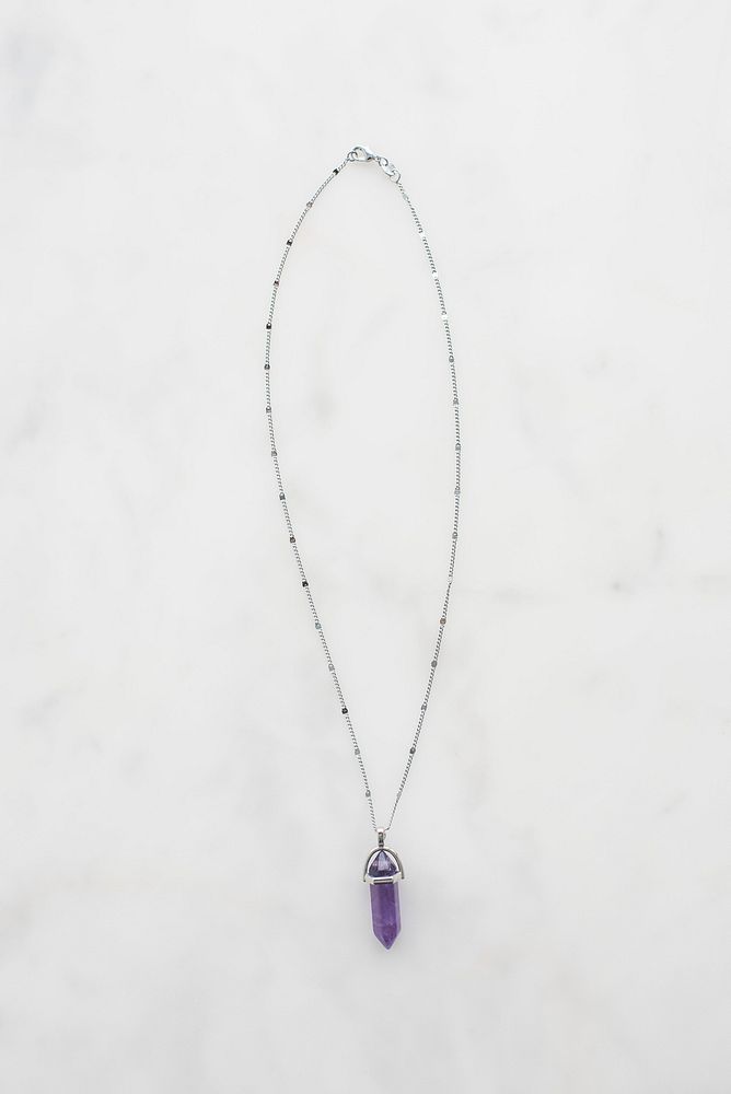 Purple gemstone pendant necklace.