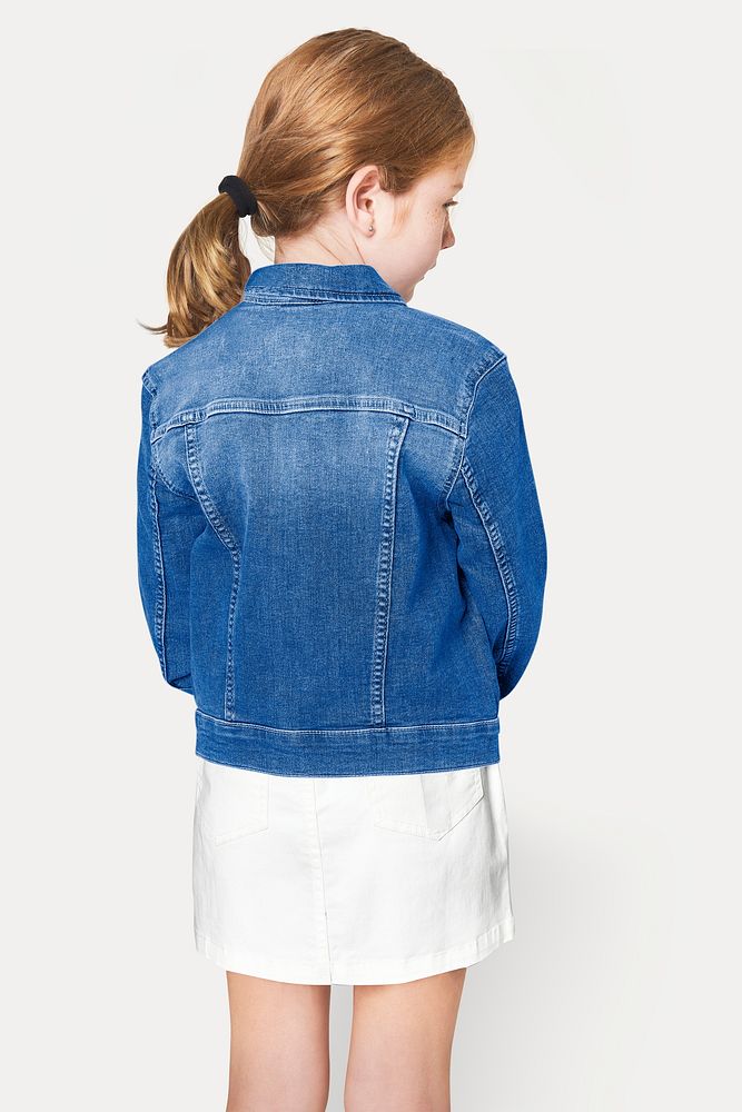 Girl's blue denim jacket psd mockup in studio