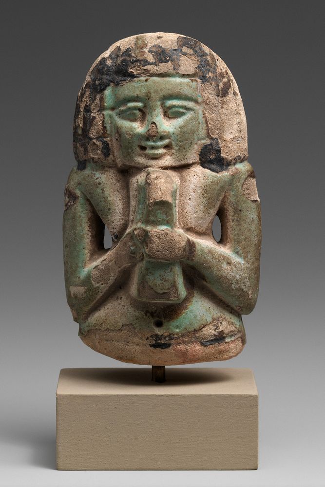 Female figure playing a lyre