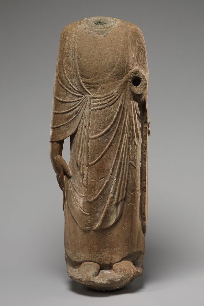 Buddhist attendant (possibly Kasyapa)