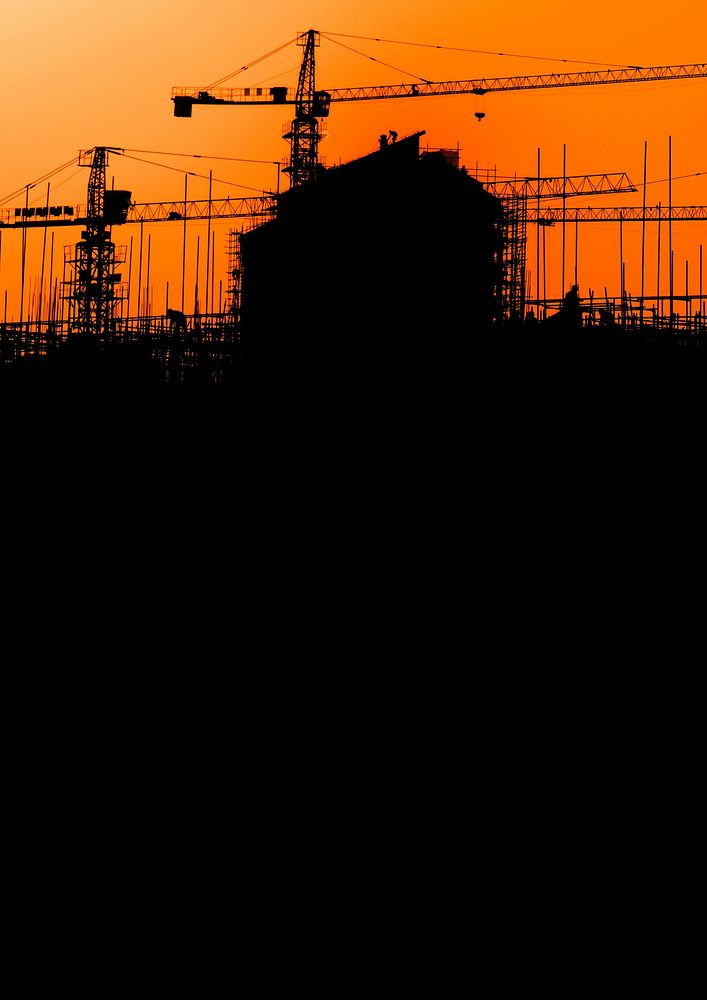 Construction silhouette, orange background