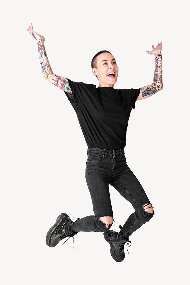 Tattooed woman wearing black t-shirt jeans jumping image element