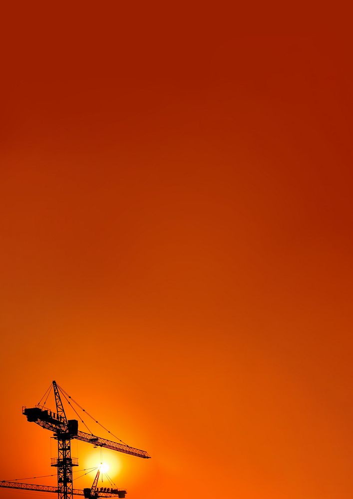 Construction crane, orange background