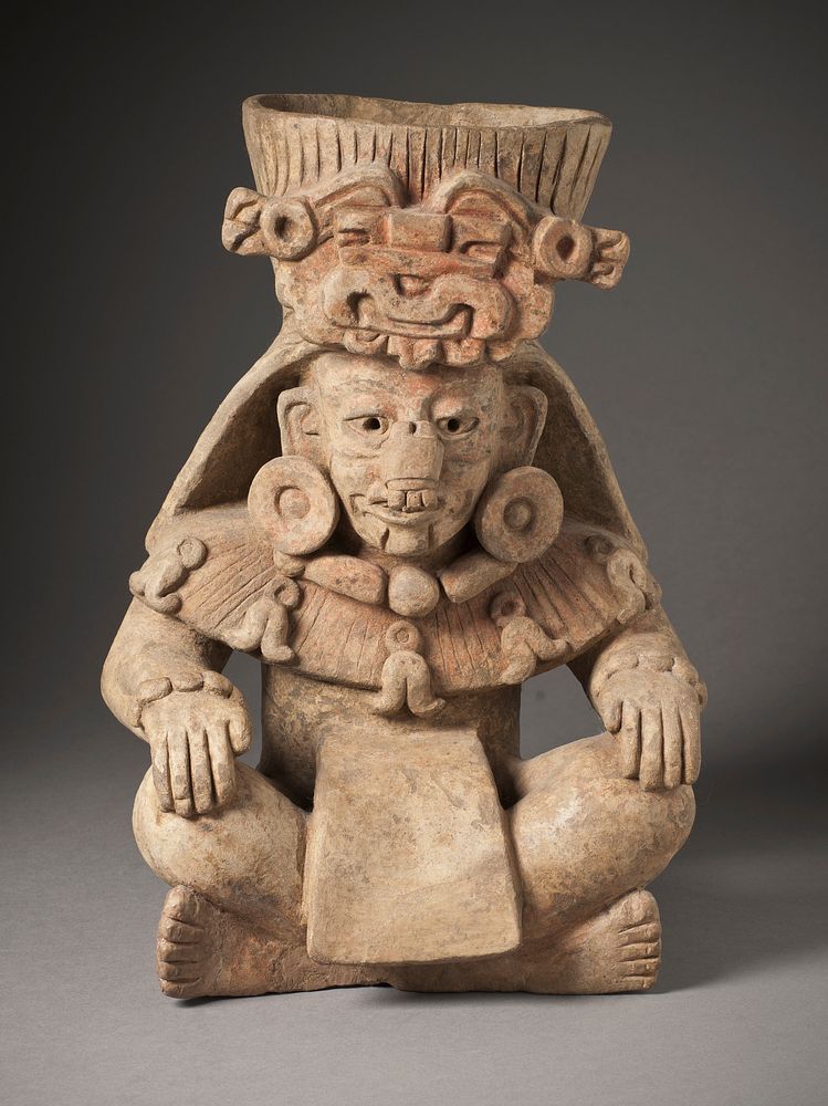 Seated Deity with Glyph C Headdress
