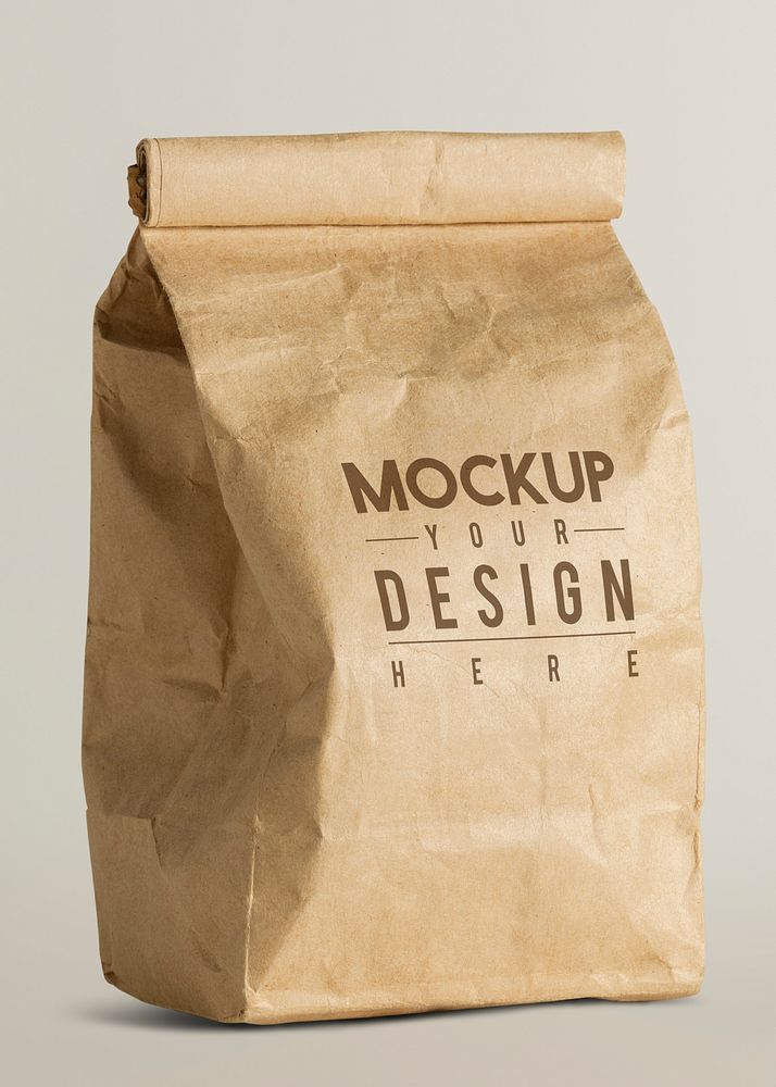 Rolled brown paper bag mockup with copy space