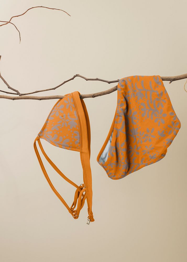 Floral bikini mockup, women&rsquo;s swimwear in orange design psd