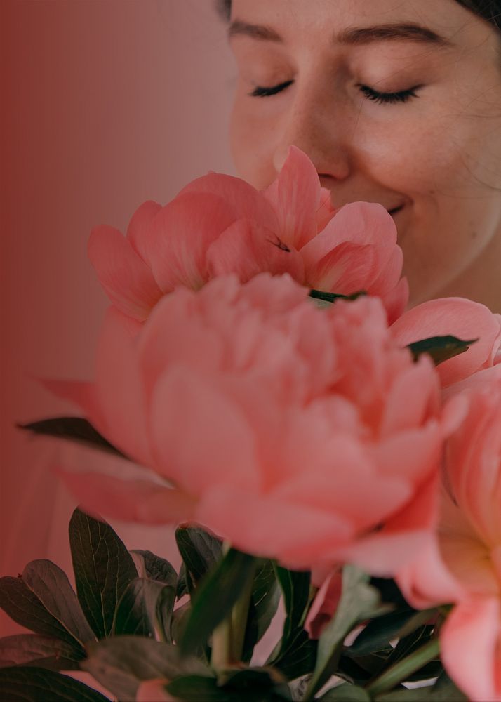 Woman smelling flower background, pink design